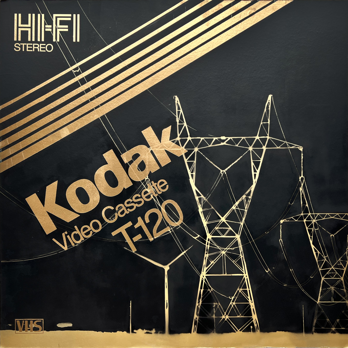 Kodak video cassette cover with pylons in gold
