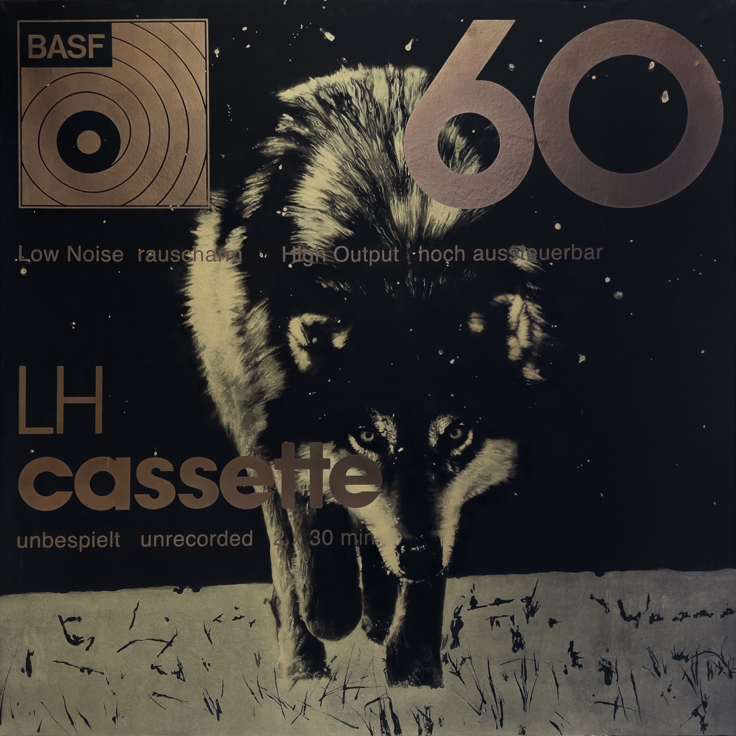 Wolf emerging from a dark landscape, overlaid with the graphic design and typography of a BASF 60 cassette.