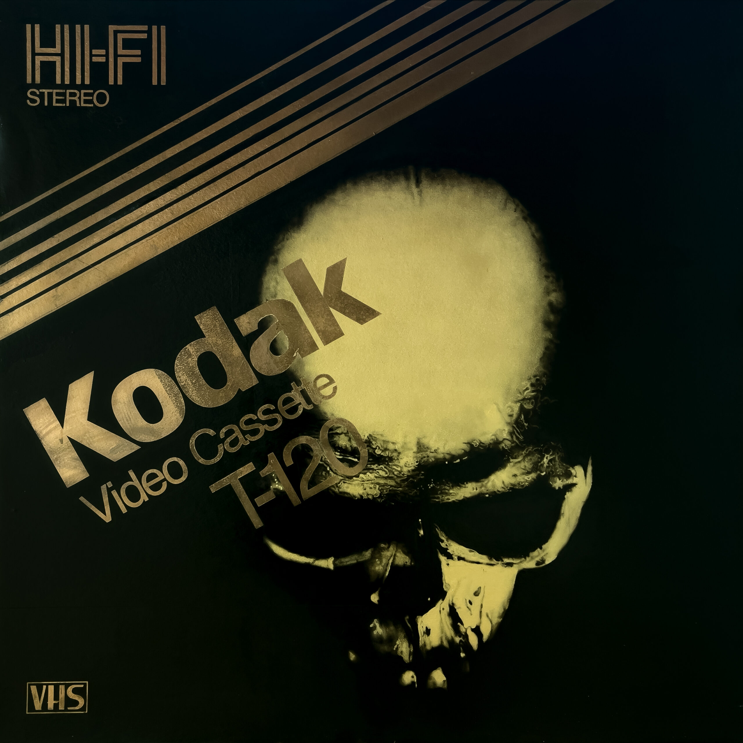 Painting of a skull emerging from a dark background, overlaid with gold Kodak Video Cassette T-120 and Hi-Fi Stereo graphics.